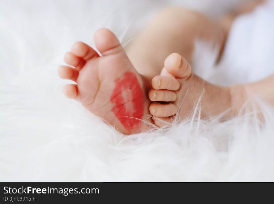 Baby Foot With Red Kiss Mark