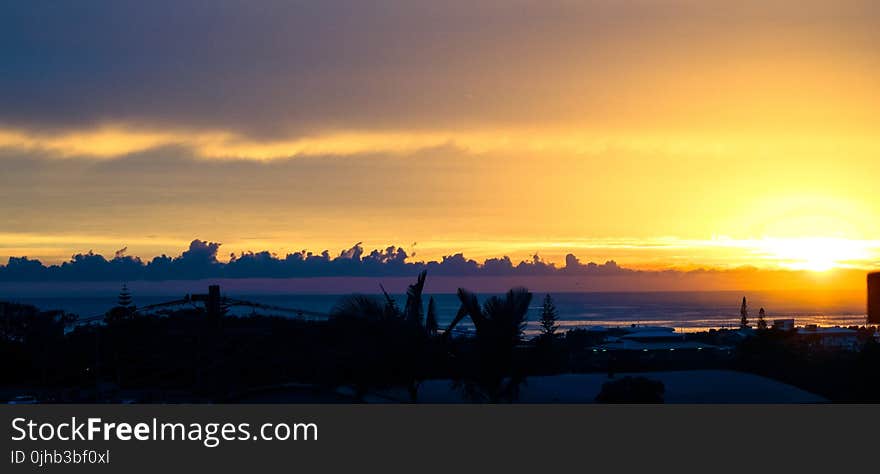 Scenic View of Ocean During Sunset