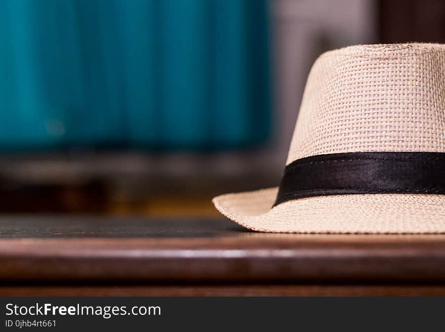 Selective Focus Photo of Brown Fedora Hat