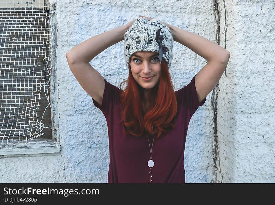 Red Haired Woman Wearing Purple T-shirt