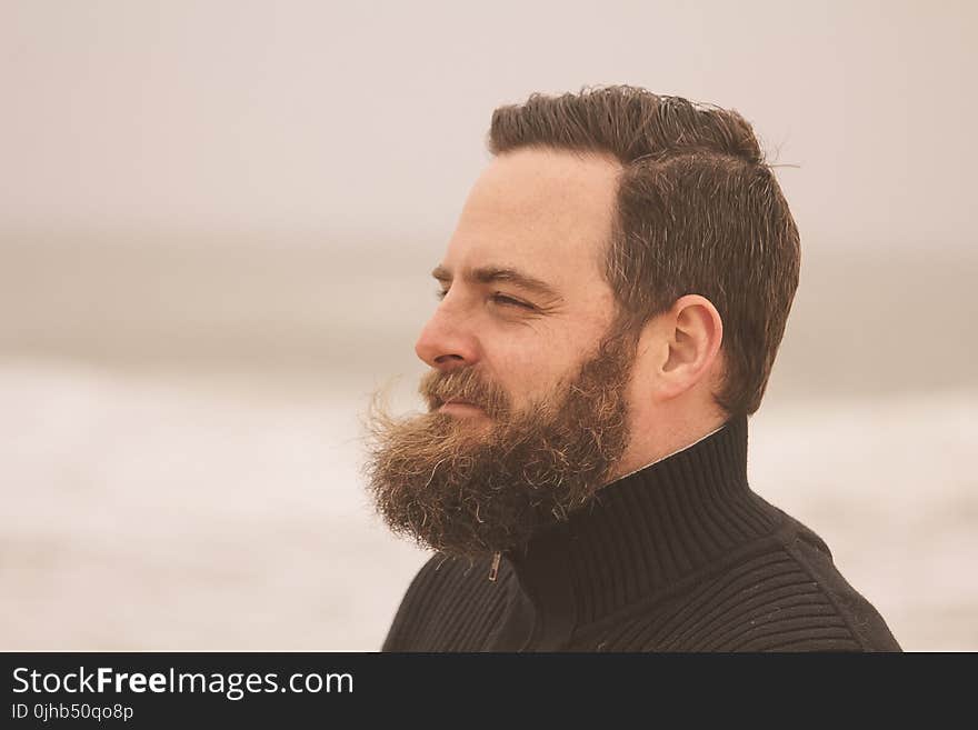 Depth of Field Photography of Man in Black Turtle Neck Top