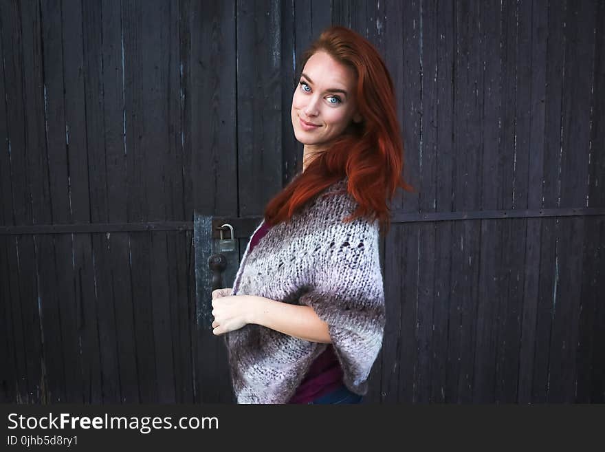 Woman Wearing Grey Printed Poncho Posing for Photo