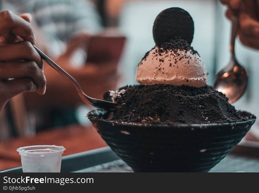 Person Scooping Ice Cream