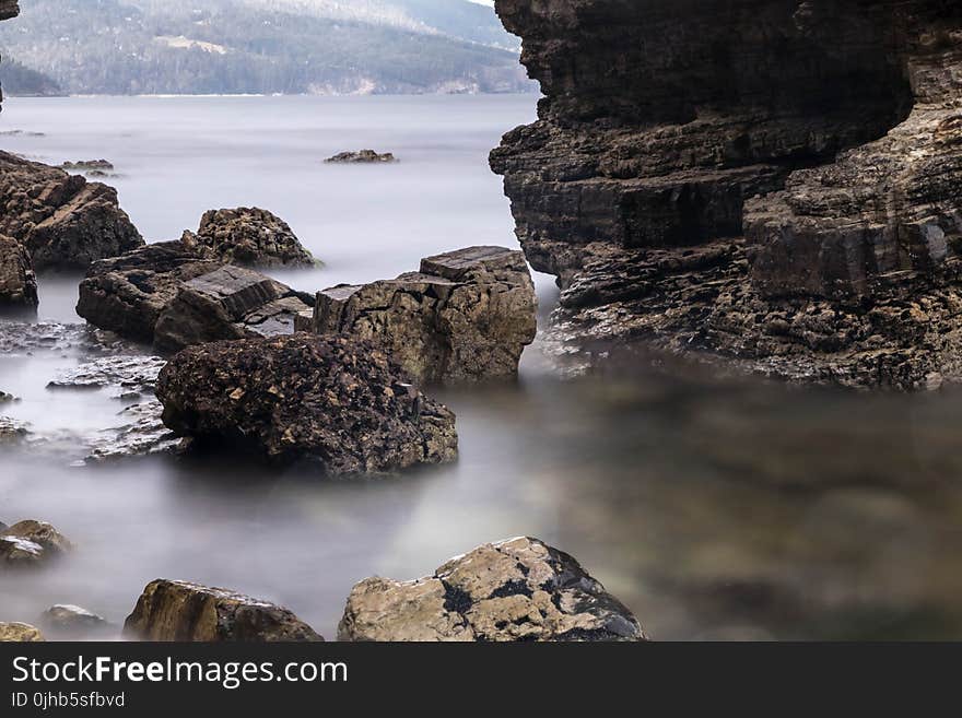 Stones Surrounded of Body of Water