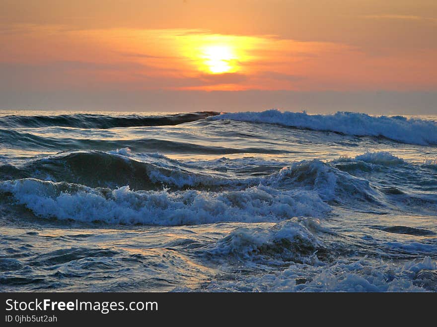 Ocean Water during Yellow Sunset