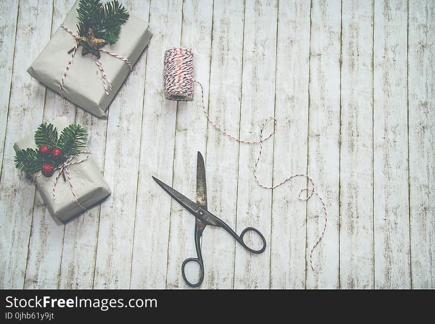 Two Gray-and-green Christmas-themed Gift Boxes