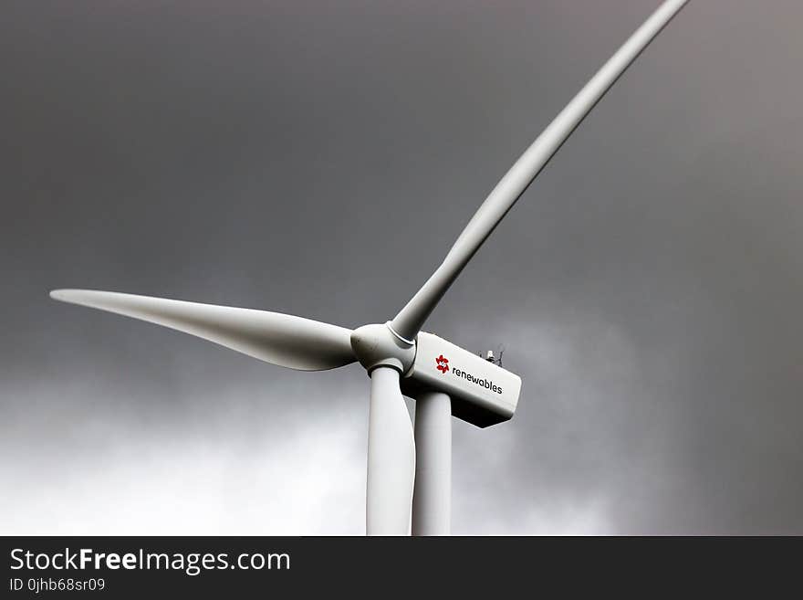 White 3-blade Windmill Under Cloudy Sky