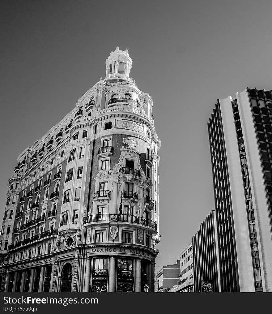 Grayscale Photo of Highrise Building