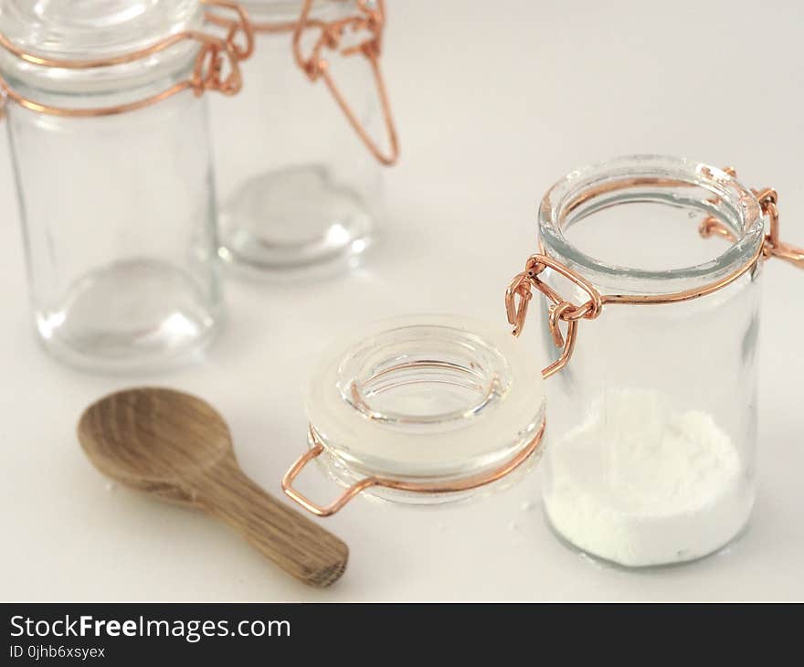 Two Clear Glass Jars