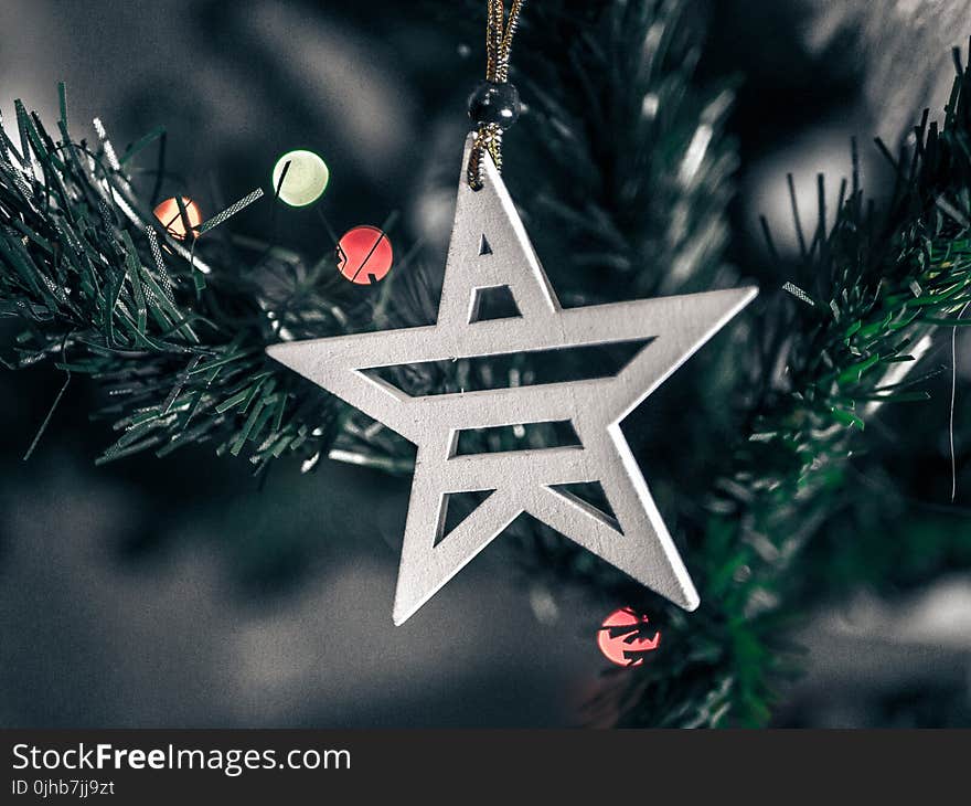 Macro Shift Photography of White Wooden Star Christmas Decor