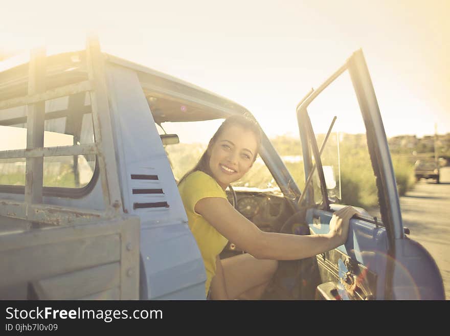 Woman Peeking Inside the Pickup Truck