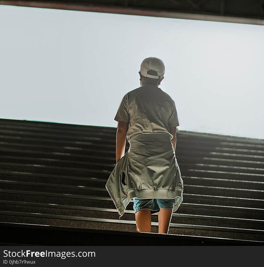 Boy Wearing Gray Shirt Standing