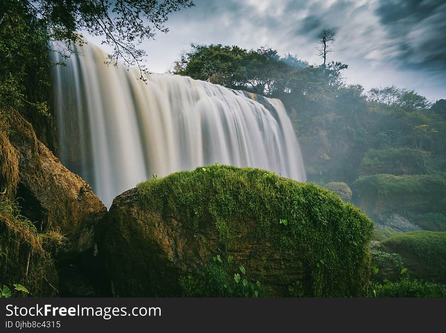 Photography of Waterfalls Surrounded by Trees