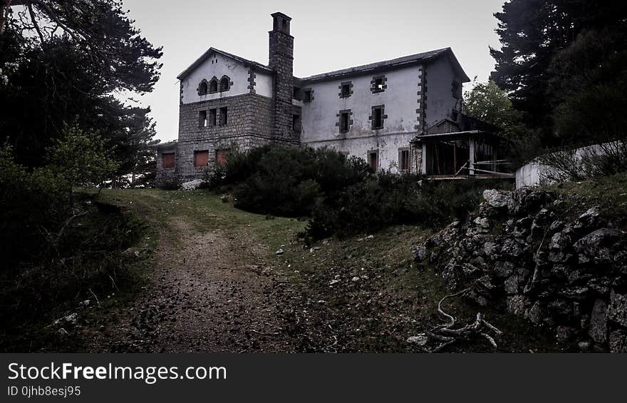 Photo of an Abandoned Concrete House