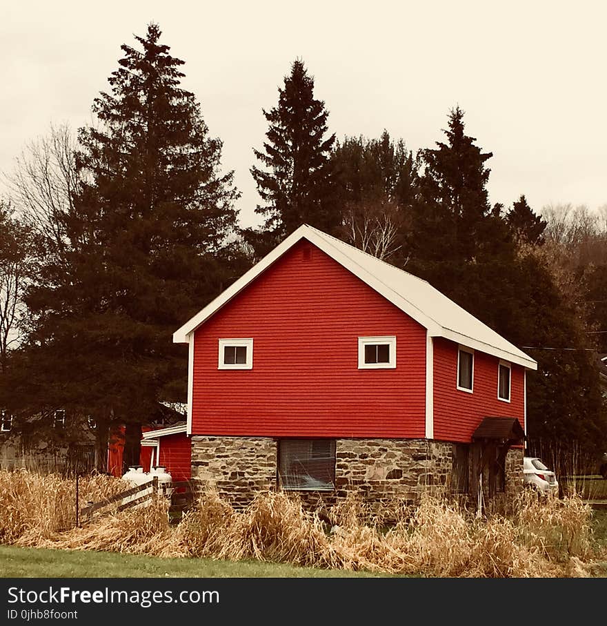 Red, Brown, and White Wooden and Brick House