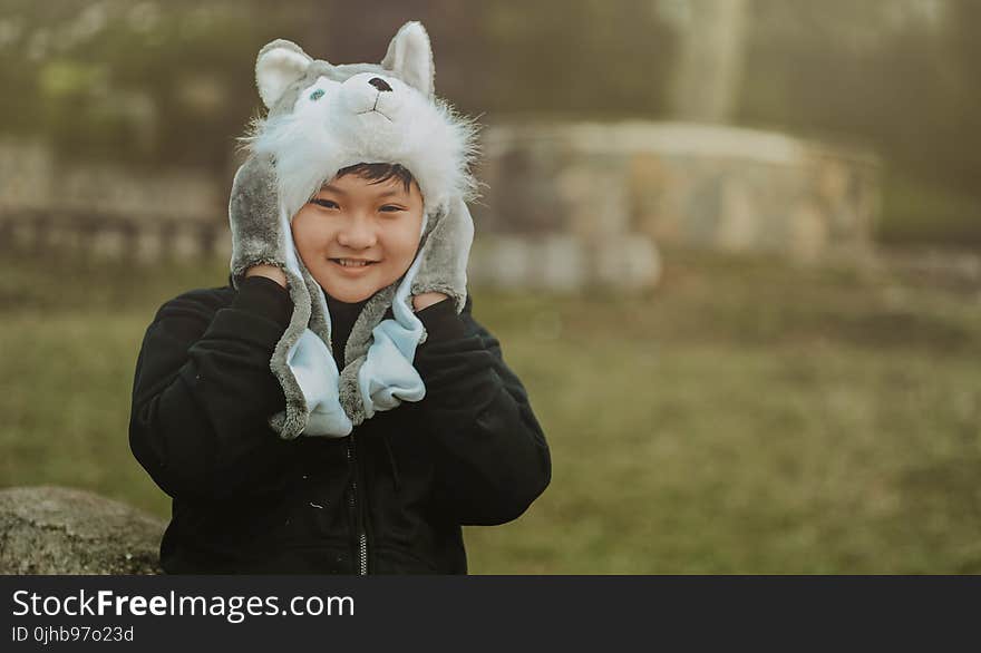 Boy Wearing Gray-and-white Cap