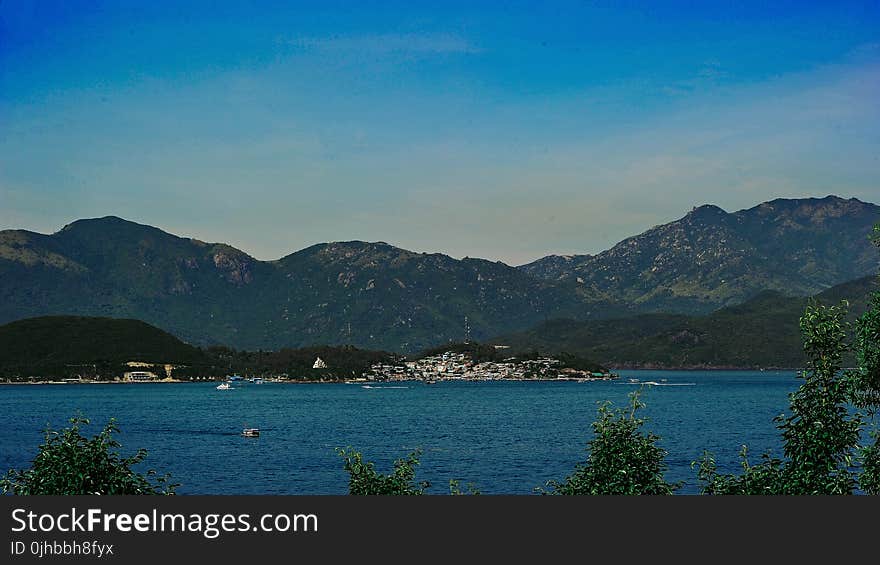 Body of Water in Distance of Place Photography