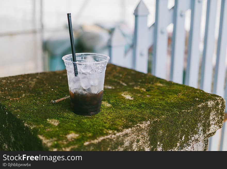 Disposable Cup With Black Beverage