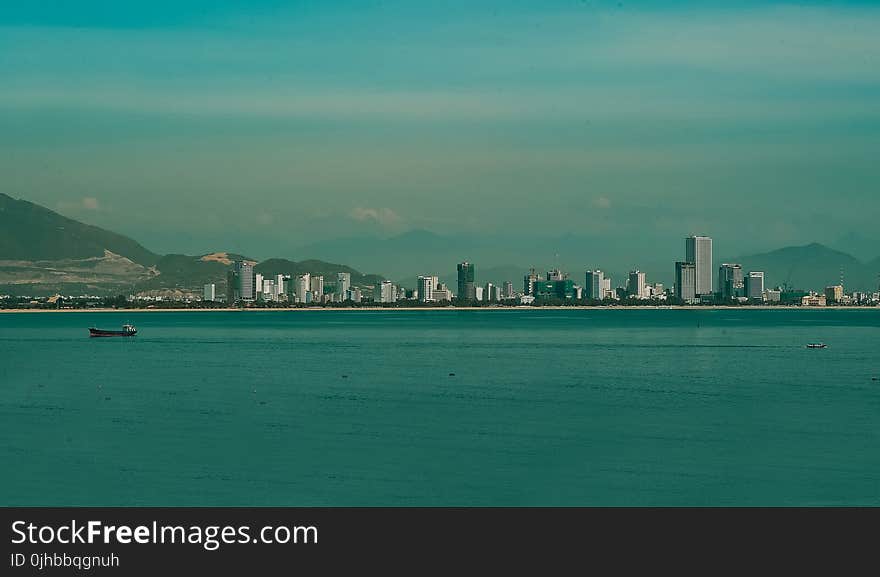 City Escape Against Mountains