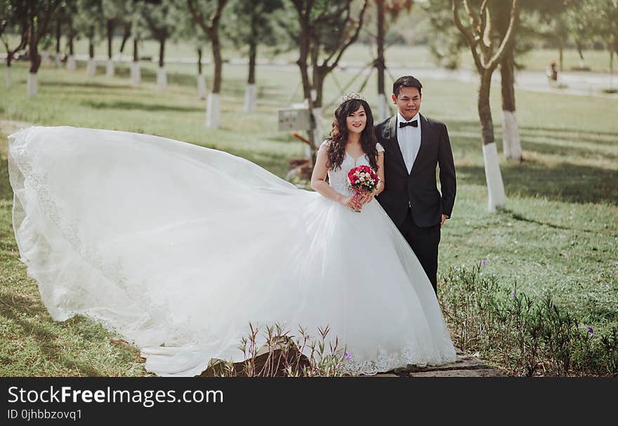 Selective Focus Photography of Groom and Bride