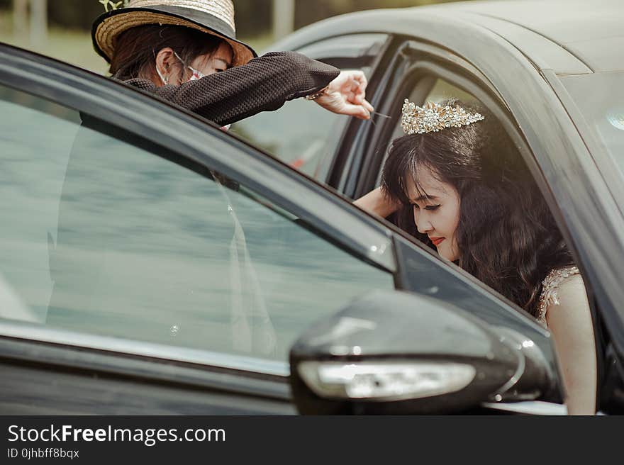 Bride Stepping Out of the Car