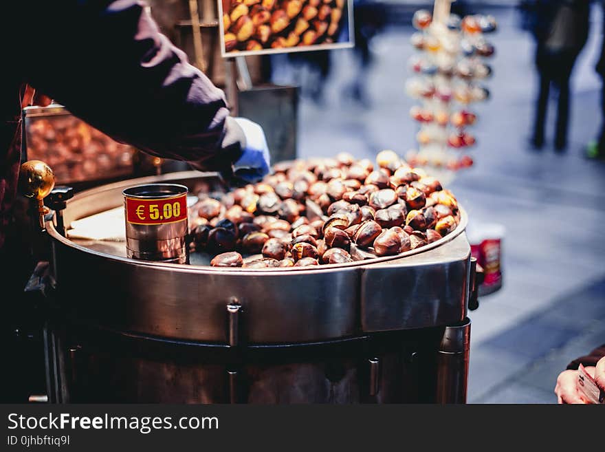 Person Selling Chestnuts