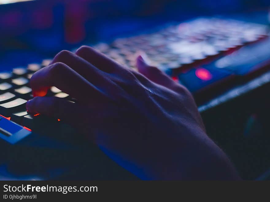 Photo of Person Typing on Computer Keyboard