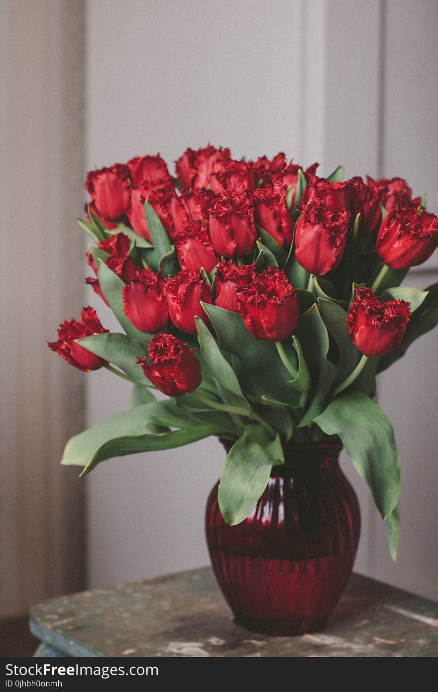 Bouquet of Red Roses on Glass Vase