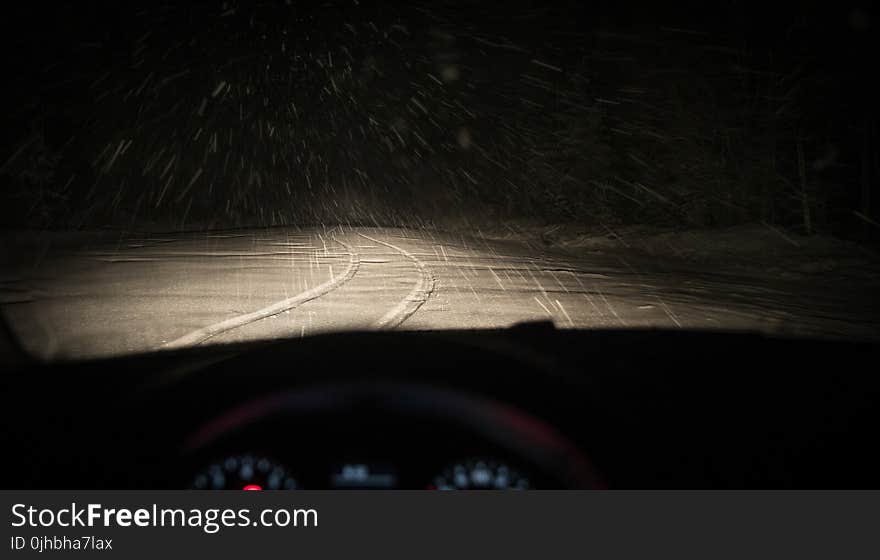 Person Taking Photo of Road Covered With Snow