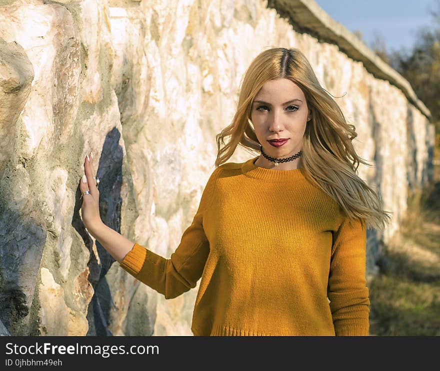 Woman In Yellow Crew-neck Sweatshirt