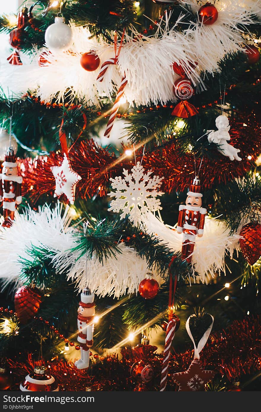 Green Christmas Tree With String Lights and Hanging Decors