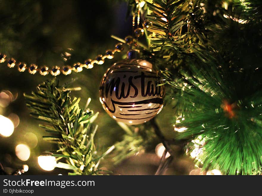 Gold Printed Bauble On Christmas Tree