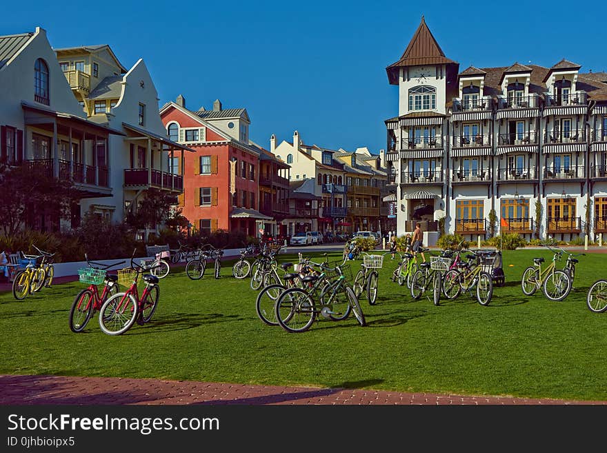 Bicycle Lot on Green Field