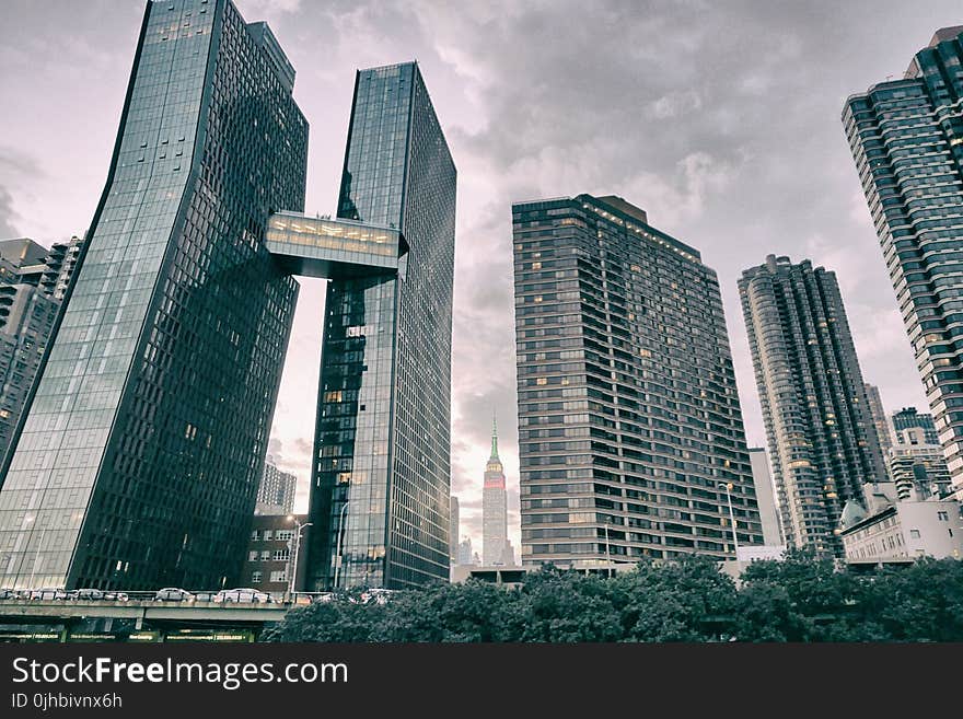 High Rise Buildings Under Cloudy Sky