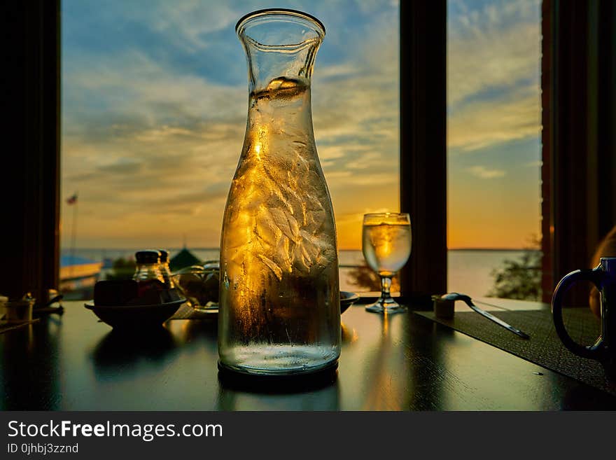 Clear Wine Glass and Clear Glass Pitcher