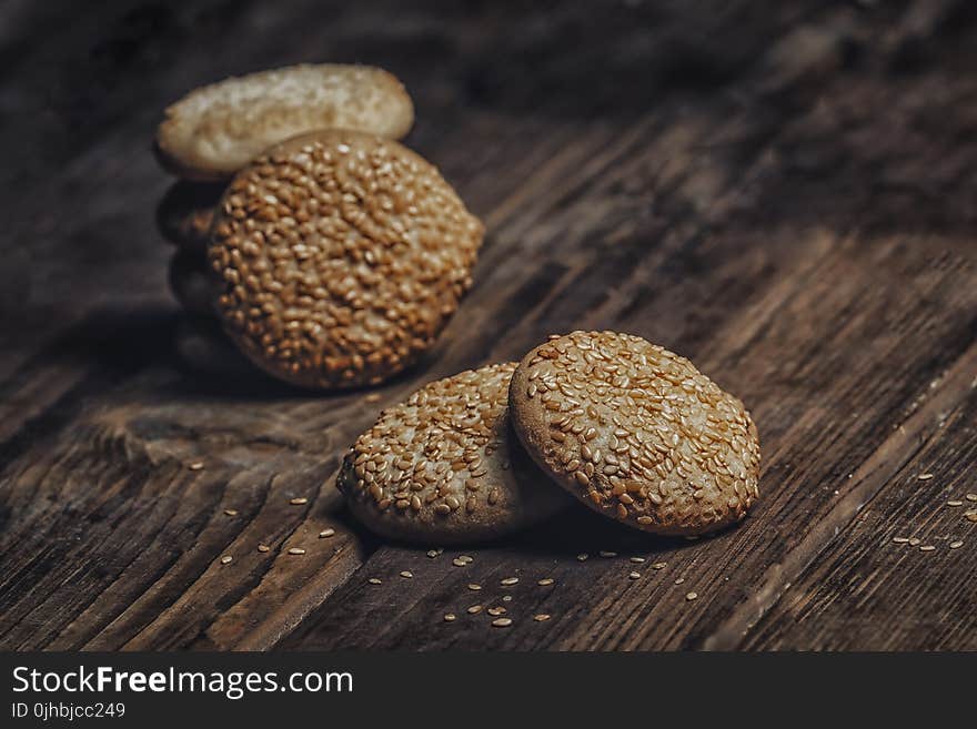 Photography of Pile of Cookies With Sesame Seeds on Table