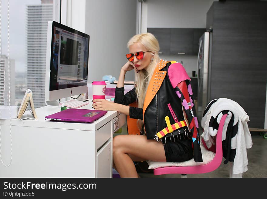 Woman Wearing Black and Orange Leather Jacket