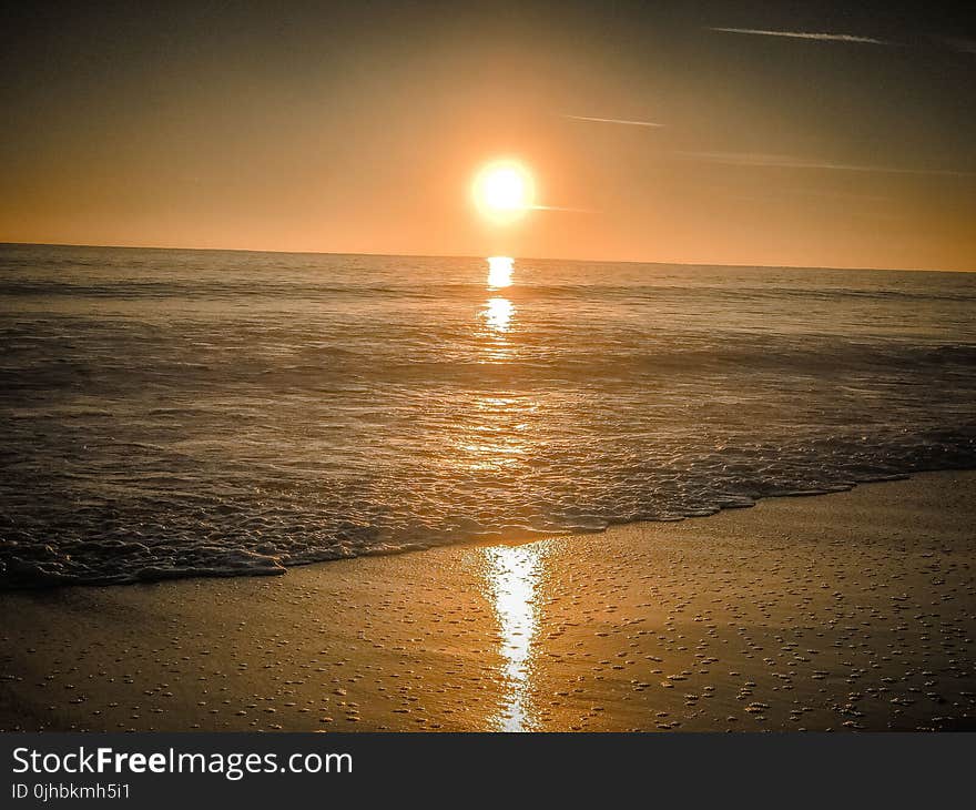 Photography of Ocean during Sunset