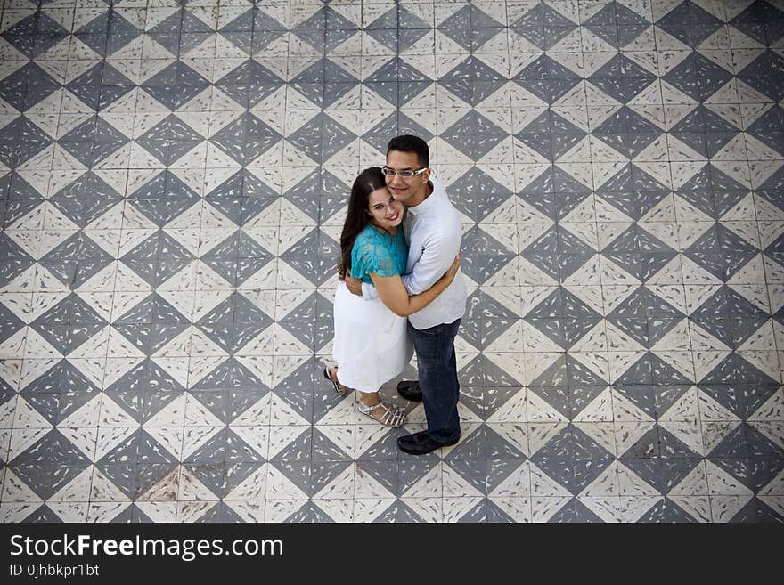 Photography of Couple Hugging Each Other