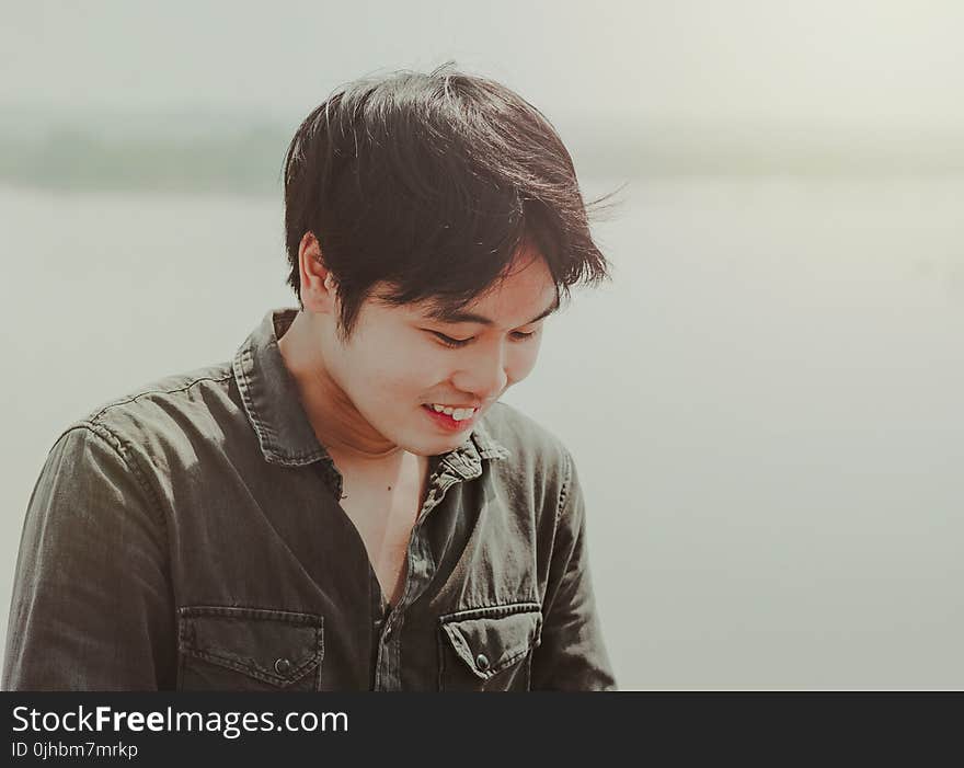 Close-Up Photography of a Man Smiling