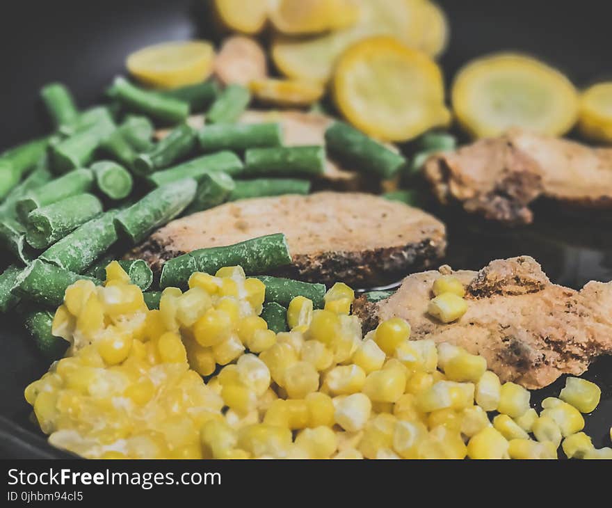 Vegetable and Meat on Black Plate