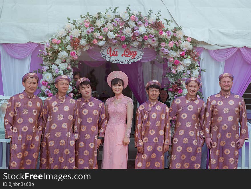 Photography of People Wearing Traditional Clothes