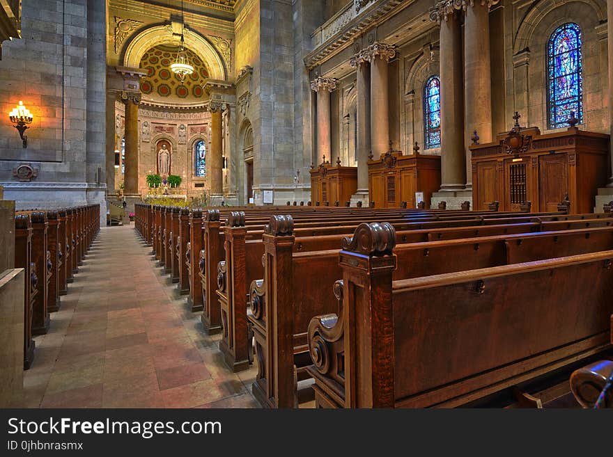 Brown Wooden Church Pew Align Facing the Altar