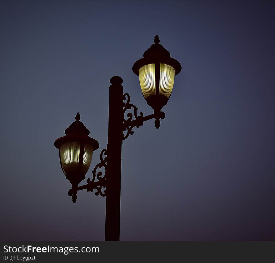 Photography of Black Metal Post Lamp During Night Time