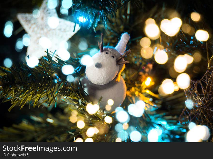 Macro Shift Photography of White Deer Ornament