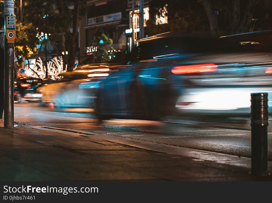 Time-lapse Photography of Silver Car Passed by on Road