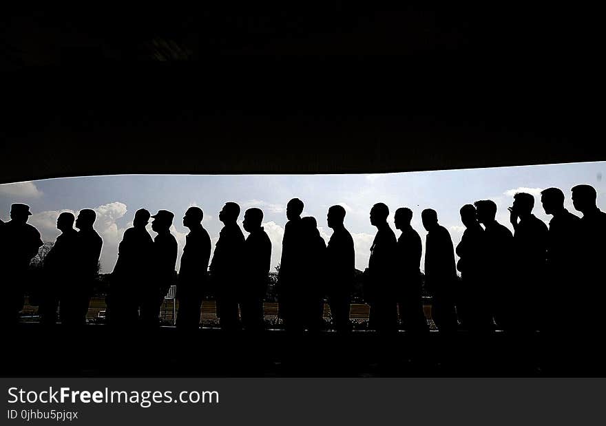 Group of Men Forming a Libe