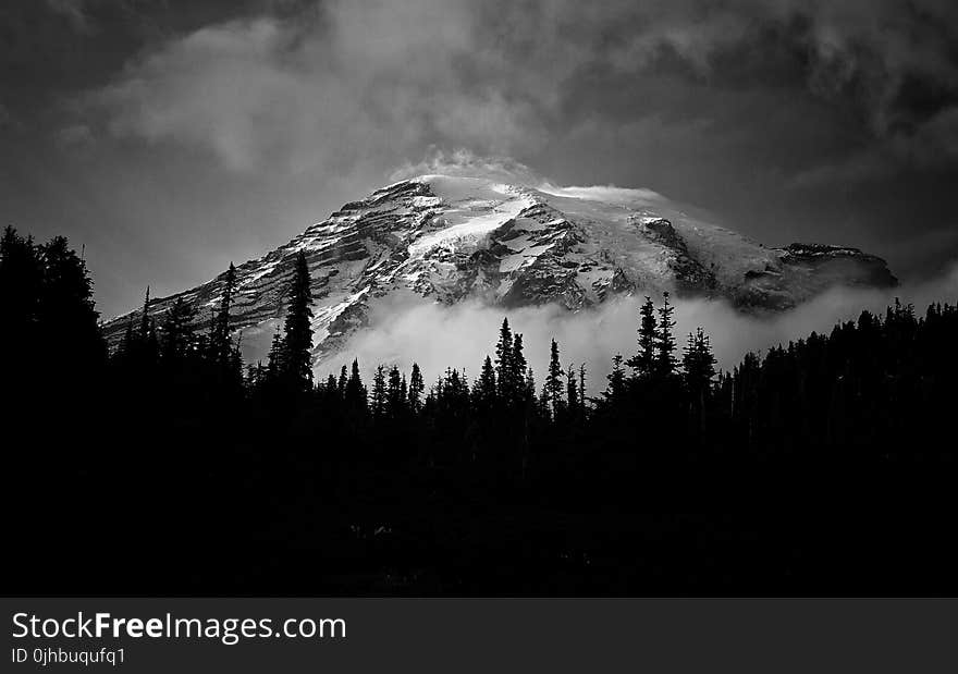 Grayscale Photo Of A Mountain Covered With Snow