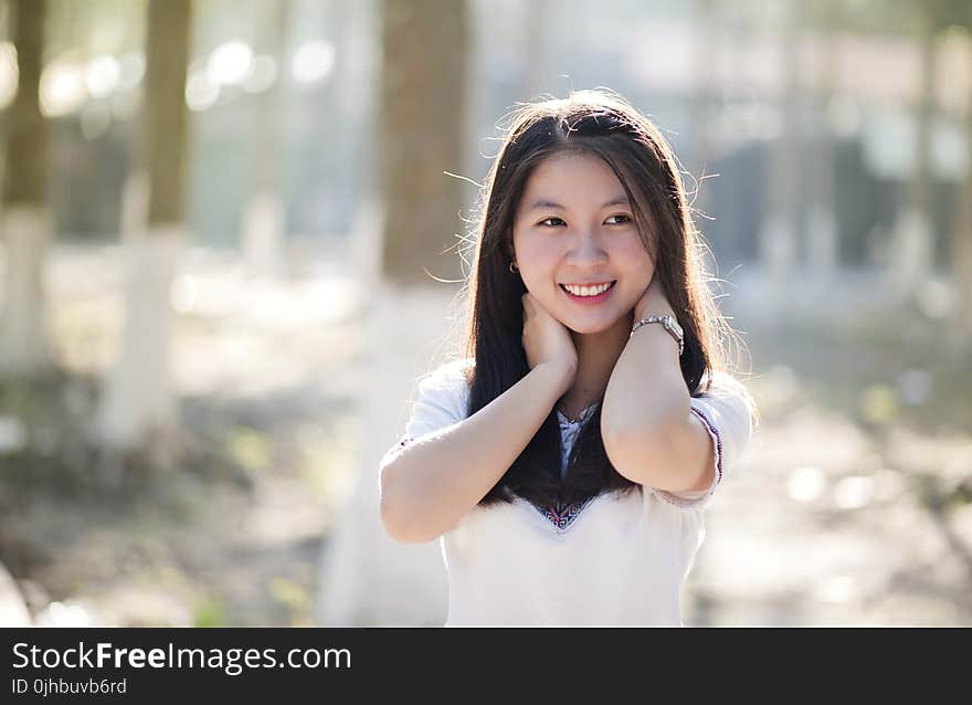 Close-Up Photography of Asian Woman Smiling