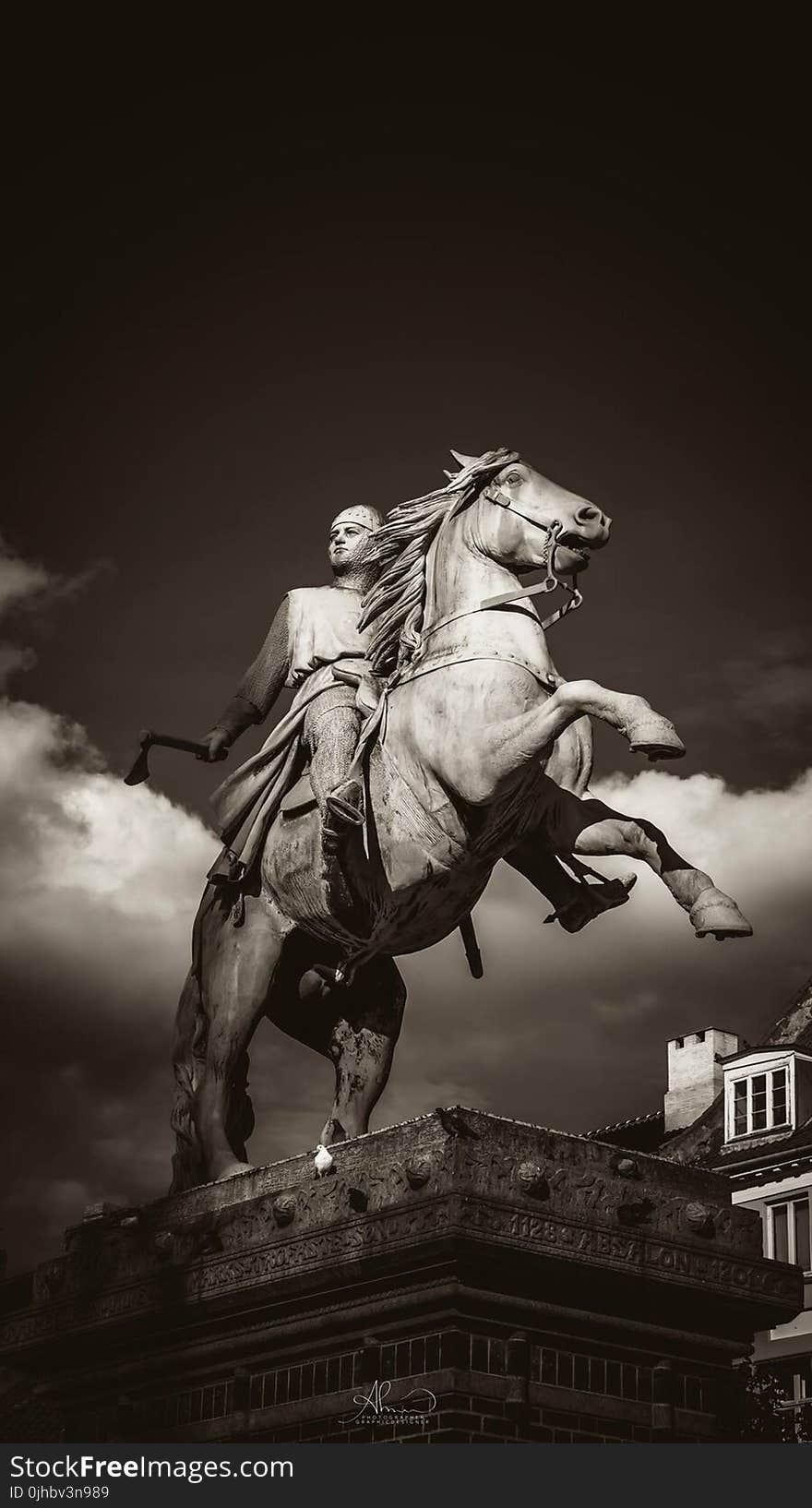 Man Holding Axe Rides On Horse Concrete Statue